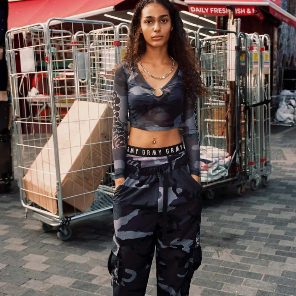 Grimey Top Tusker Temple Micro Mesh Girl Crop - Black | Fw23 Best